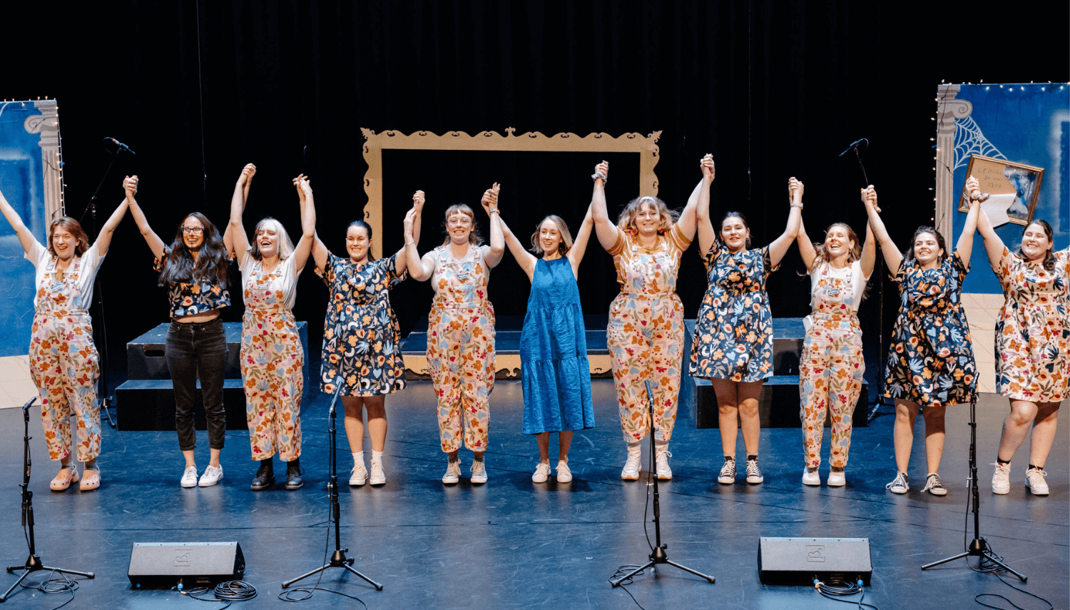 speech and drama teachers bowing on stage