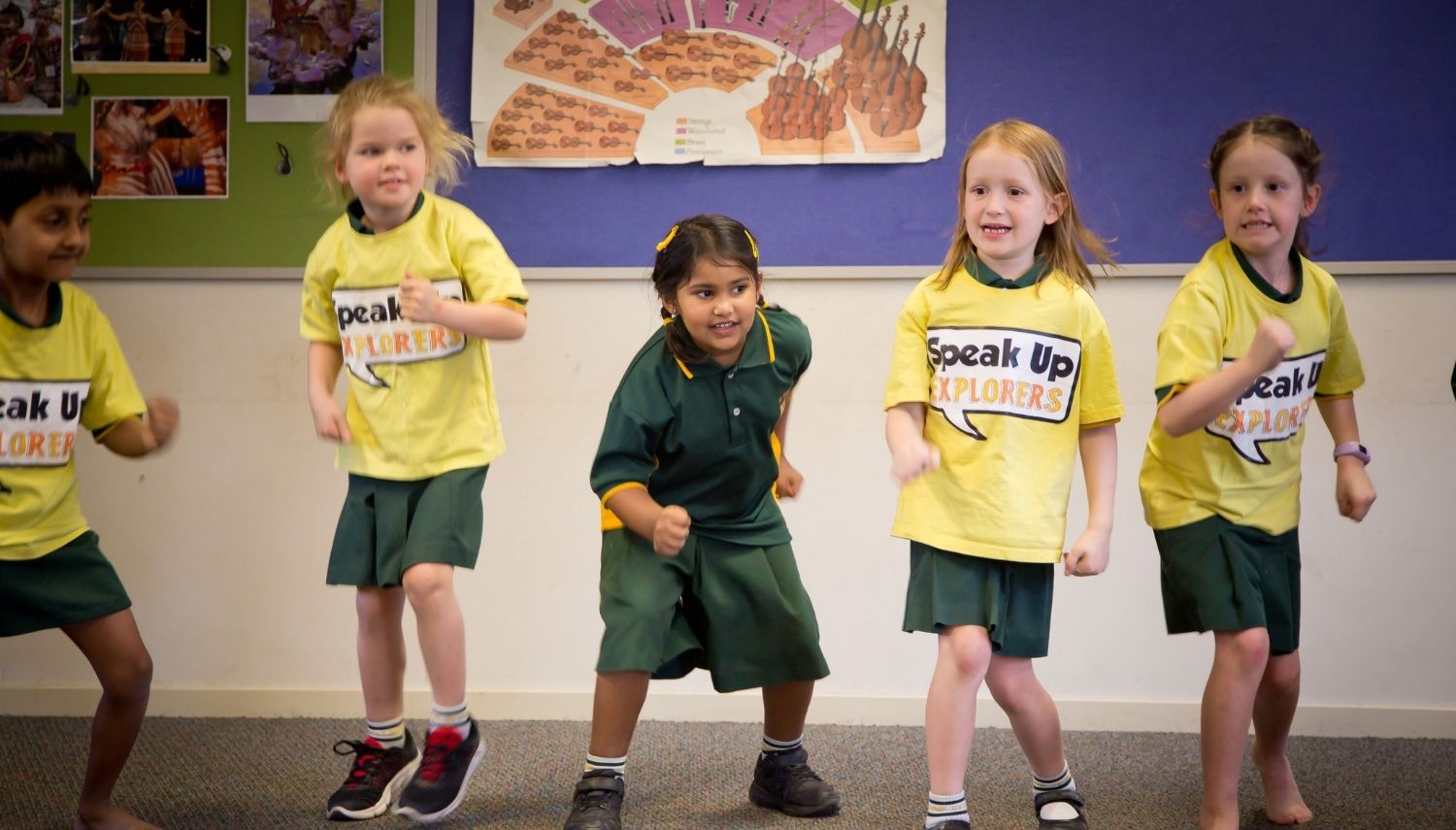 Kids standing up in the classroom